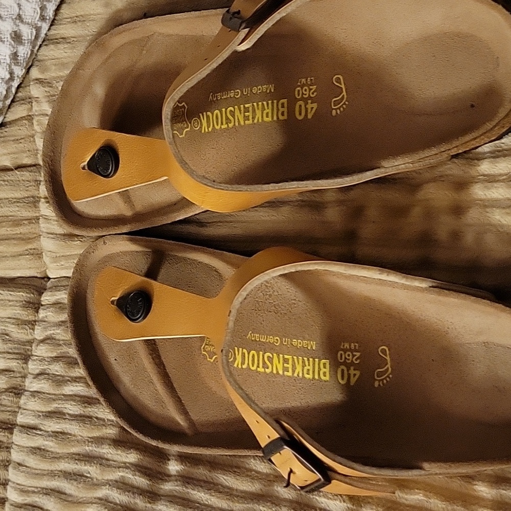Birkenstock  rose gold metallic.   Size 40 ladies 9 men's 7